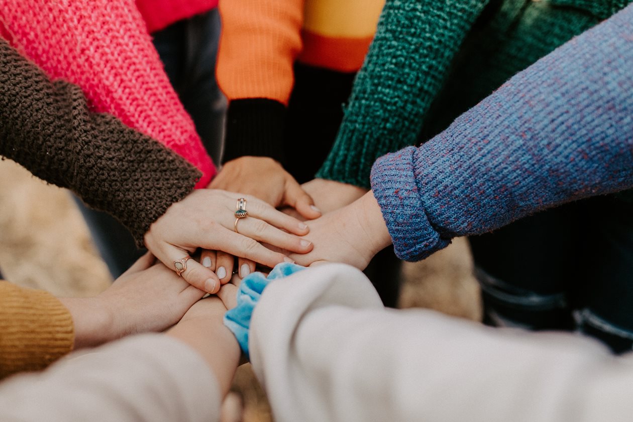 Image of hands coming together